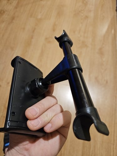 Customer photo: the mount held in a hand