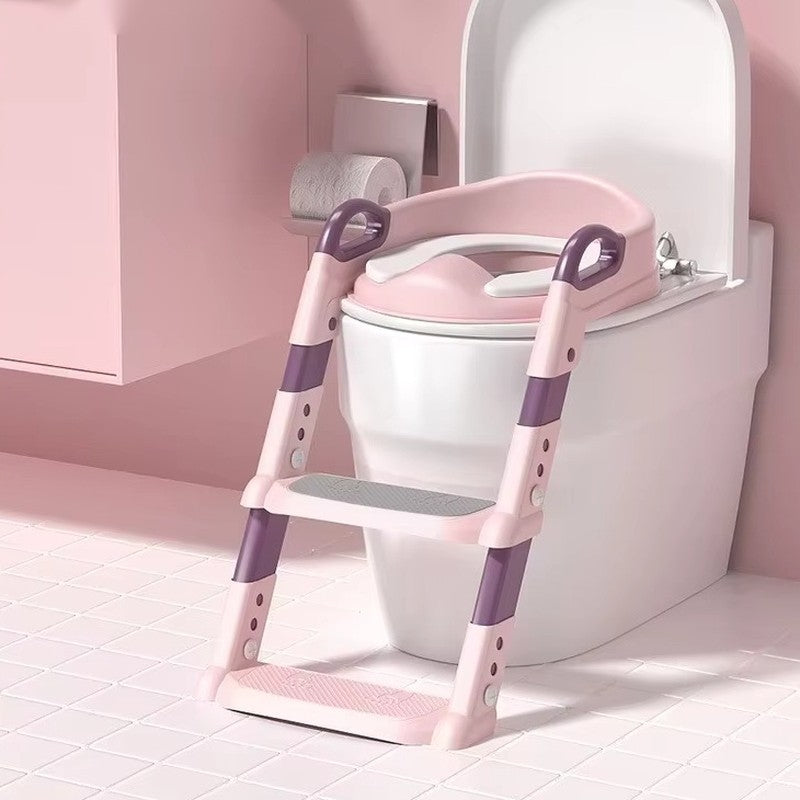The potty ladder in a pink bathroom