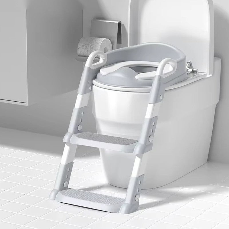 The potty ladder in a gray bathroom