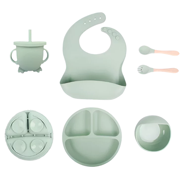 Sage green silicone baby feeding set: bib, suction plate, bowl, cup and spoon