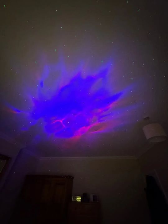 Customer photo: nebula and star projection on a bedroom ceiling