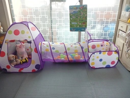 Customer photo: the 3-in-1 set assembled on a play mat with soft toys in the tent