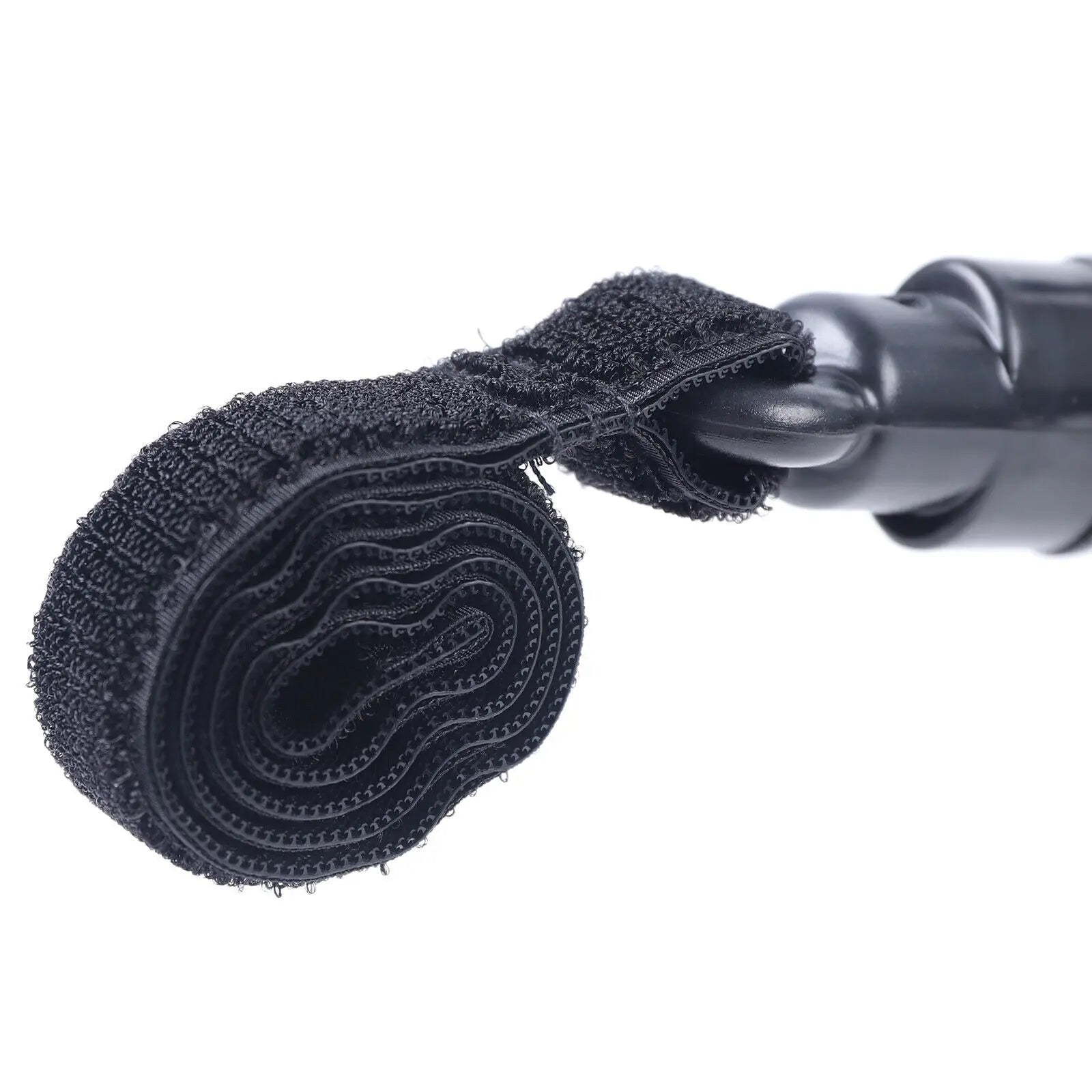 Hook-and-loop strap on the stroller board arm